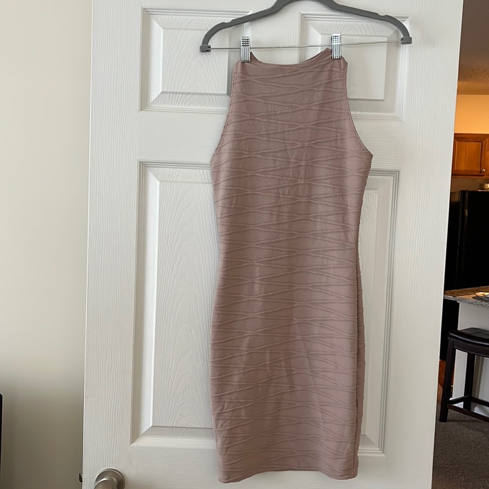 This dress is great. It molds to your body for that sleek look